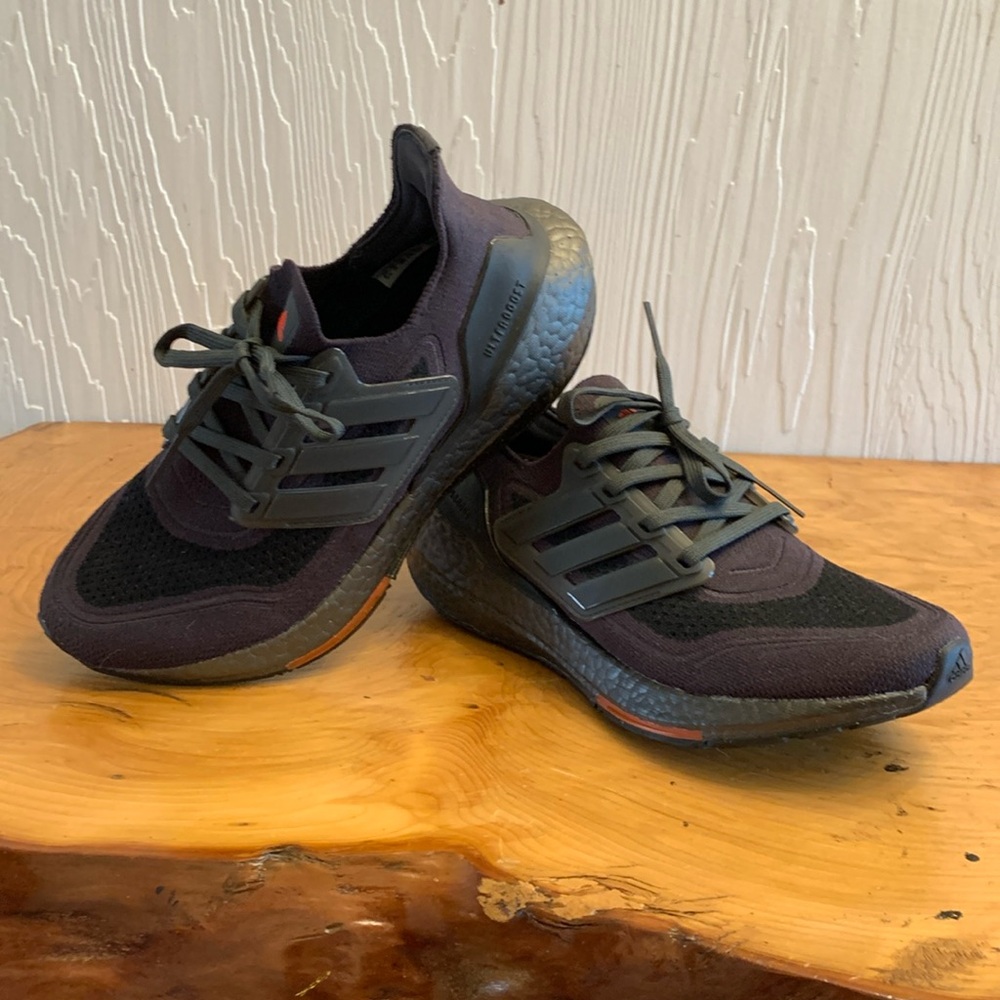 Adidas ultra boost light. Double black with red accents. women’s 7. Men 5.5